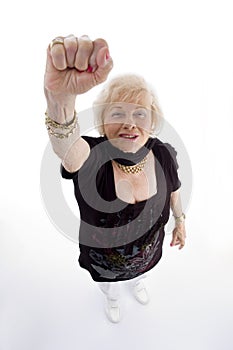 High angle view of old woman showing punch