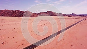 High angle view over a highway stretching through the desert