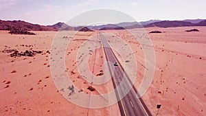 High angle view over a highway stretching through the desert