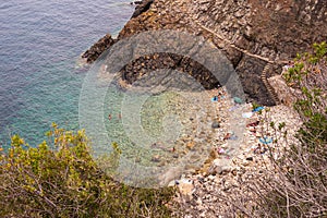 High angle view over little Crocetta beach, situated near Marciana Marina, Elba island, Italy photo