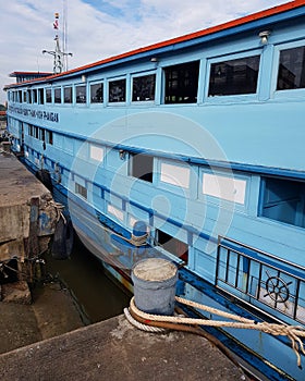 High angle view of passenger boat mooored at harbor