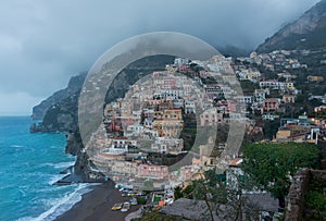 A high angle view of Positano with colorful buildings.