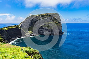 High angle view of the rocks on the body of the ocean at Morro do Castelo Branco, Azores, Portugal