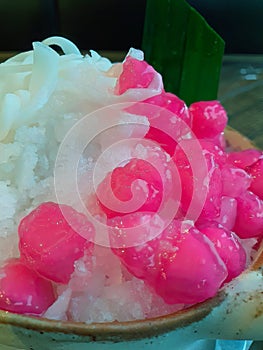 High angle view, selective focus, Red Rubies Dessert or Tub Tim Krob, Thapthim krop, famous Thai sweet local menu,