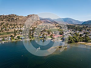 High-angle view of Skaha lake and Christie Memorial Park during the summer.