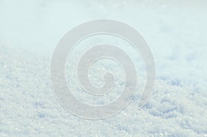 High angle view snow background. Tillable snow texture. Winter background with snow drifts