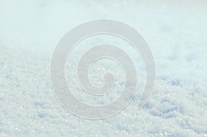 High angle view snow background. Tillable snow texture. Winter background with snow drifts photo