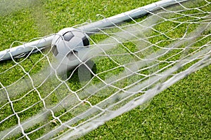 High angle view of soccer ball in goal post