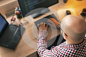 Software developer working in home office