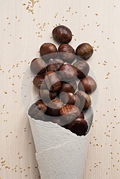 Chestnuts in a paper cone photo