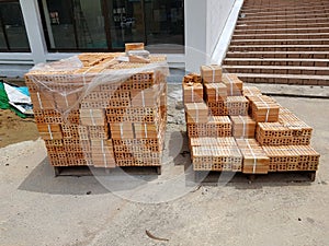 High angle view of stack of bricks at construction site
