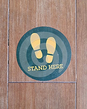 High angle view of standpoint symbol on floor
