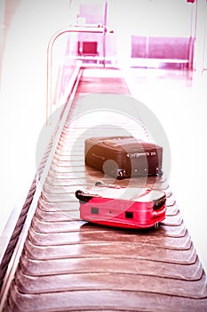 High angle view of suitcase on baggage claim