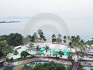 High angle view of swimming pool in the garden and summer beach