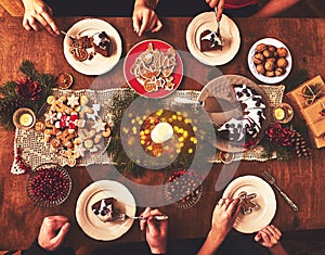 High angle view of table served for Christmas family dinner. Tab