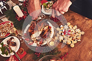 High angle view of table served for Christmas family dinner. Tab