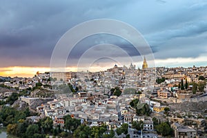 High angle view of the Toledo city in Spain under the dark cloudy sky