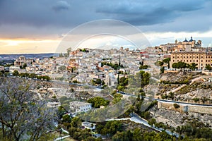 High angle view of the Toledo city in Spain under the dark cloudy sky