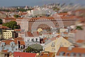 High angle view on traditional houses and apartmet buildings of Lisbon, artistic impression with Lensbaby