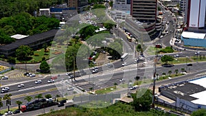 High angle view of daily traffic at intersection downtown district