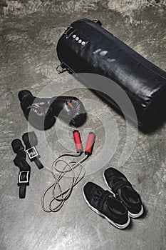 high angle view of various boxing equipment lying