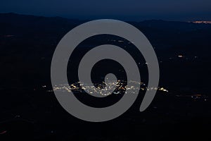 High angle view of the village of Villanueva de la Concepcion in the mountains of Malaga at night