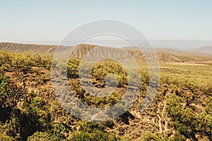 High angle view of volcanic rock formations in Rift Valley seen from Mount Longonot in Naivasha, Kenya