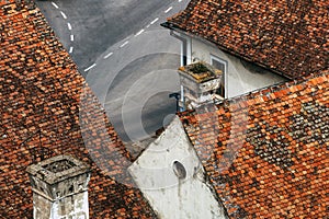 High angle view of worn rooftops and chimneys of house in old town of Petrovaradin, now part of Novi Sad