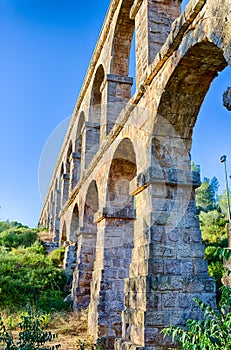High archade of roman aqueduct near Tarragona, Spain photo