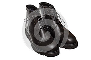 High black winter boots with lacing and lock on the thick sole, of leather and fur