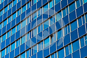 A high blue glass office building