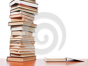 High books stack on white background