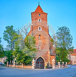 The bell tower of Holy Cross Church in Krakow, Poland photo