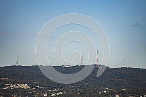 High broadcasting towers on the top of mountain