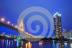 High building at the river in night time