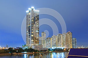 High building at the river in night time
