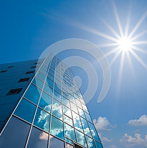 Business centre building in light of sparkle sun