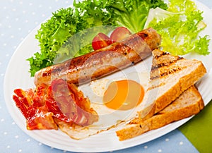 High-calorific breakfast with fried sausage