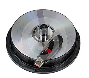 High-Capacity USB Flash Drive On Stack of CD Discs photo