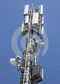 high cell tower with antennas and repeater of mobile telecommunication