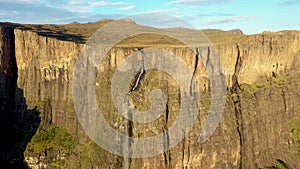 High cliff with Tugela falls in morning. Scenic Drakensberg mountains in South Africa