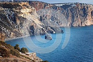 High cliffs over the sea under a blue sky with clouds. Fiolent.