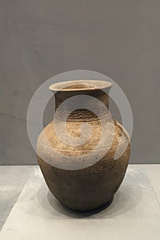 high-collared earthenware jar with cord pattern