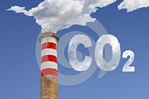 High concrete chimney emits CO2 into the atmosphere - concept image