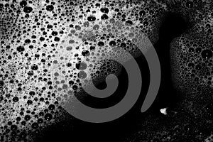 High contrast Black and white macro photography texture backgrounds, soapy bubbles in water