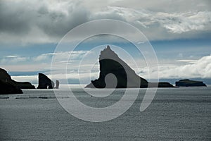 High contrast of Drangarnir gate and Tindholmur, Faroe Islands