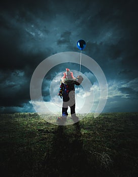 Scary clown on a dark background photo