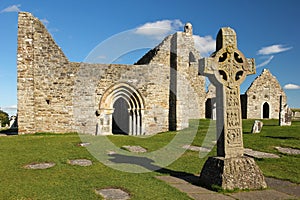 High Cross of the scriptures and cathedral. Clonmacnoise. Ireland photo