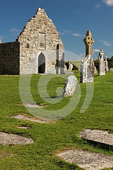 High Cross and temple. Clonmacnoise. Ireland photo