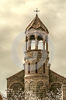 High cylindrical bell tower of St.Mesrop Mashtots Church in the village of Oshakan